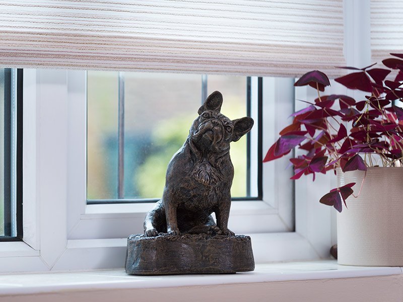 Our lovely figurine ashes urns are so discreet and look lovely in any setting. Sculptured ornamental ashes urns caskets for pets.